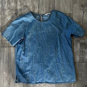 Blue denim shirt with pearls